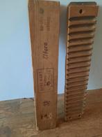 Houten sigarenmaker, Ophalen