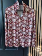 Dames travel blouse, Ophalen