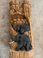 Afrikaans houtsnijwerk/plaquette, Ophalen