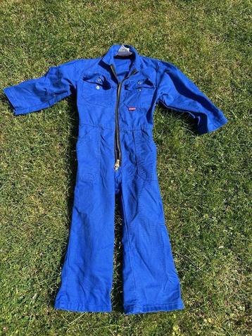 Donkerblauw kinderoverall in maat 98 beschikbaar voor biedingen