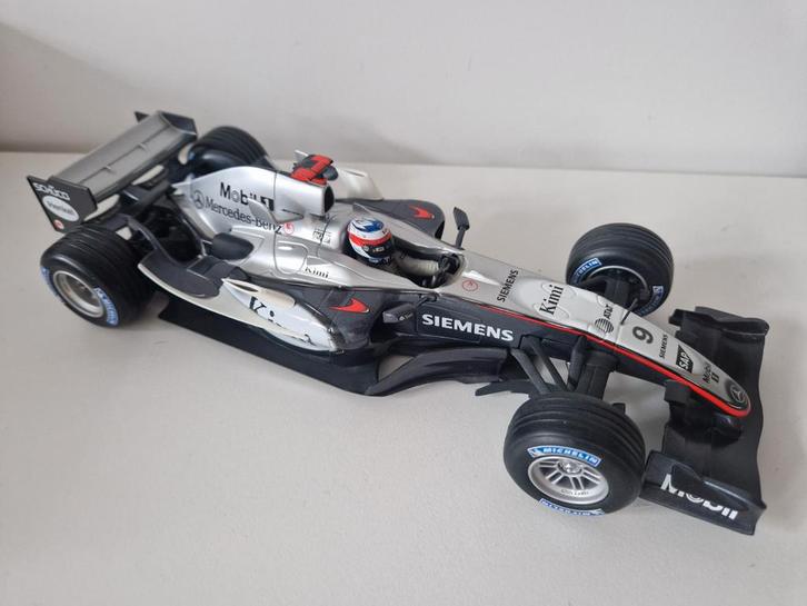 McLaren F1 Modelauto - Kimi Räikkönen Formule 1 1:18 2005, Hobby en Vrije tijd, Modelauto's | 1:18, Zo goed als nieuw, Auto, Overige merken