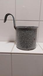 Grijsgewolkte melkschep, Ophalen