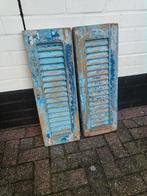 Oude blauwe luiken, Ophalen