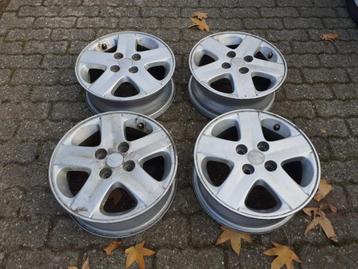 Originele DAIHATSU Velgen - LMV - Set van 4 stuks + Naafdop beschikbaar voor biedingen
