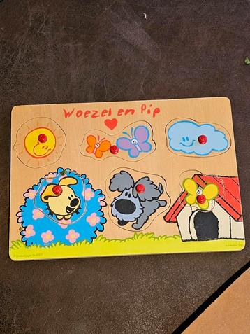 Houtenpuzzel van woezel en pip beschikbaar voor biedingen