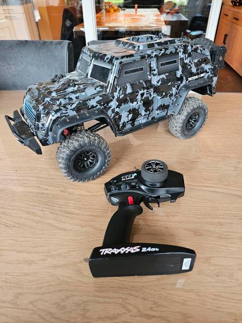 Traxxas trx4 tactical unit met upgrades, Hobby en Vrije tijd, Modelbouw | Radiografisch | Auto's, Zo goed als nieuw, Auto offroad