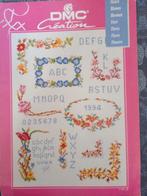 DMC Borduurpatroon - Bloemen en Letters, Ophalen of Verzenden, Gebruikt, Handborduren, Patroon