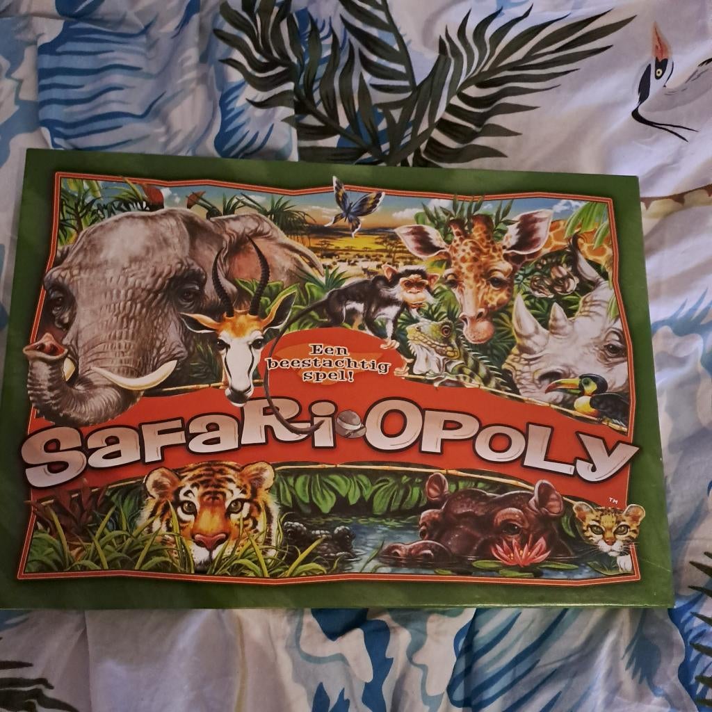 safari opoly, Hobby en Vrije tijd, Gezelschapsspellen | Bordspellen, Vijf spelers of meer, Ophalen of Verzenden, Gebruikt