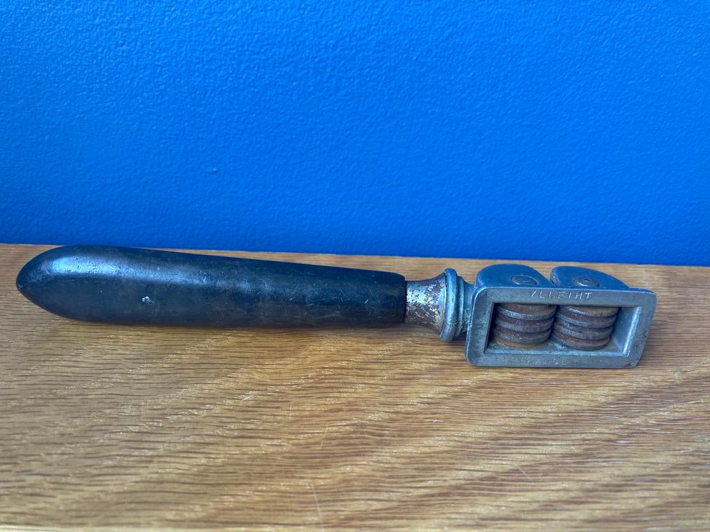 Antieke messenslijper met bakkelieten handvat, Ophalen of Verzenden