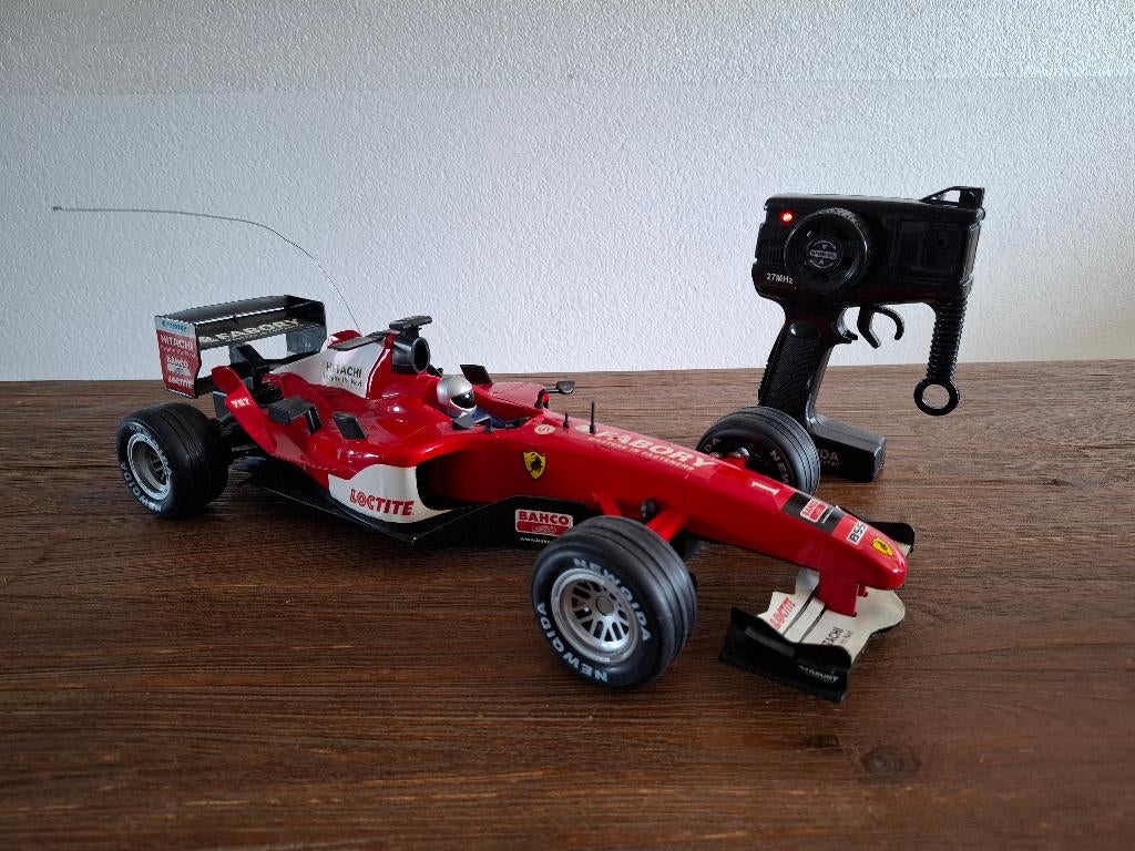 Afstand bestuurbare auto - F1 Ferrari, Elektro, Ophalen of Verzenden, Zo goed als nieuw, Auto onroad