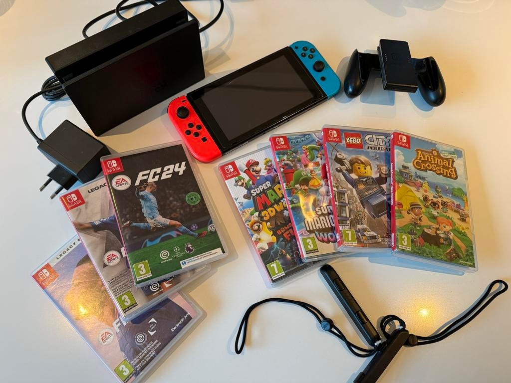 Nintendo Switch met 7 spellen en accessoires, Spelcomputers en Games, Gebruikt, Eén computer, Ophalen of Verzenden, Sport