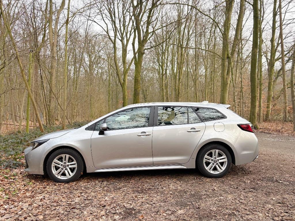 Toyota Corolla TS 1.8 Hybrid 122pk CVT 2022 Grijs, Auto's, Toyota, Bedrijf, Corolla TS, ABS, Adaptive Cruise Control, Airbags