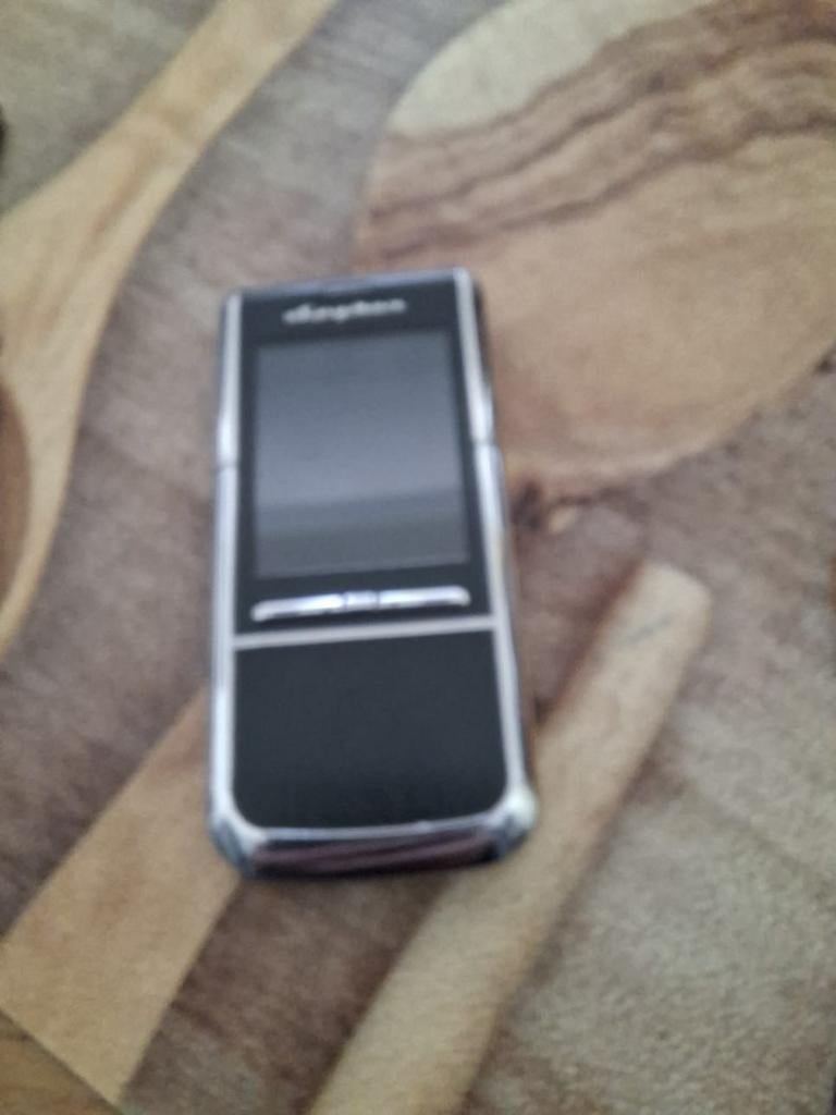 Batterij en oplader gezocht voor Spyker telefoon (2007), Ophalen of Verzenden