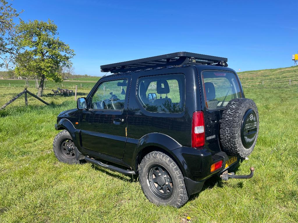 Suzuki Jimny 1.3 JX 4WD 2004 Zwart, Auto's, Suzuki, 13 km/l, 40 €/maand, Zwart, 4 cilinders