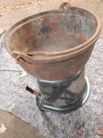 antieke gietijzeren kookpot, Ophalen