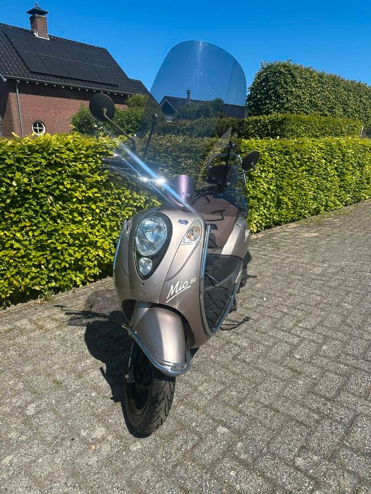 SYM MIO te koop!, Fietsen en Brommers, Scooters | SYM, Zo goed als nieuw, Mio, Maximaal 25 km/u, Benzine, Ophalen