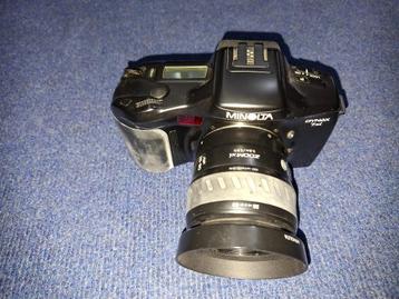 Minolta 7 xi met zoomlens 28-80mm en flitser beschikbaar voor biedingen