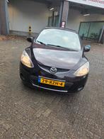 Mazda 2 1.3 S-VT EXCLUSIVE PAARS 75PK 5DRS ELEK RAMEN AIRCO, Voorwielaandrijving, Stof, 74 pk, Zwart