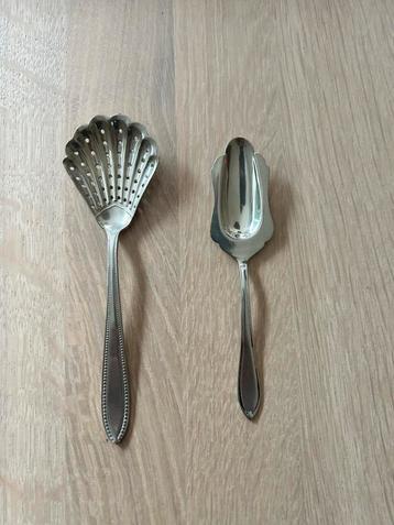 2 antieke lepels (suiker,kaneel of cacao) beschikbaar voor biedingen