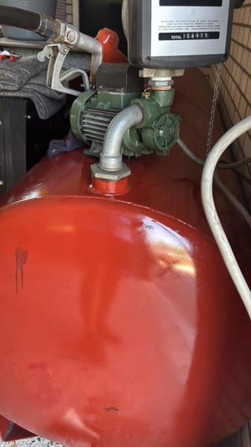 dieselpomp met meter en complete slang beschikbaar voor biedingen