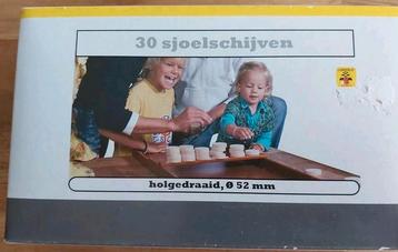 Sjoelschijven holgedraaid beschikbaar voor biedingen
