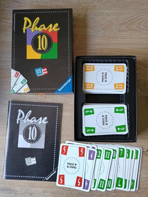Phase 10 ravensburger oude versie us bestseller 2005, Hobby en Vrije tijd, Gezelschapsspellen | Bordspellen, Zo goed als nieuw