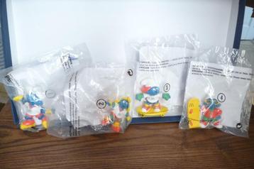 4 NIEUWE MAC DONALD SMURFEN 1998 NR 1,2,3,EN 4 IN VERP DUITS beschikbaar voor biedingen