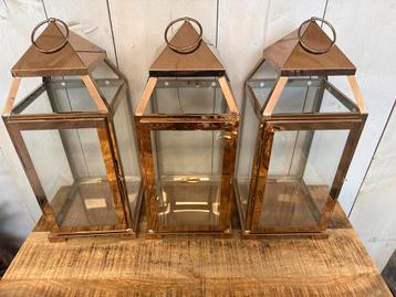 Drie mooie windluchten in rosé goud. beschikbaar voor biedingen