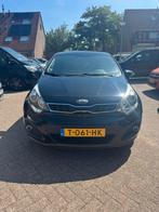 Kia Rio 1.4 Cvvt 80KW A4 5DRS 2013 Zwart, Auto's, Kia, 450 kg, Beige, 4 cilinders, 1396 cc