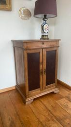 Houten kastje, Ophalen
