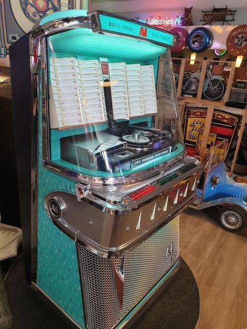 Ami i200  3 jaar garantie, Verzamelen, Automaten | Jukeboxen, Zo goed als nieuw, Ami, 1950 tot 1960, Met singles, Ophalen
