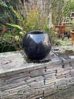 Diepzwarte granieten (graf) kogelvaas, Ophalen