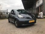 Toyota Aygo 1.0 12V Vvt-i 5DRS 2007 Grijs, Auto's, Voorwielaandrijving, Stof, Zwart, 4 stoelen