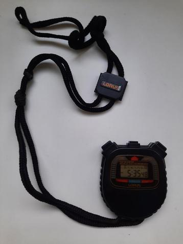Vintage Lorus Quartz Stopwatch R23, met dag en datum display beschikbaar voor biedingen