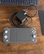 Nintendo Switch Lite, Spelcomputers en Games, Spelcomputers | Nintendo Switch Lite, Ophalen of Verzenden, Grijs, Zo goed als nieuw