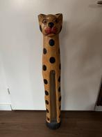 Grote houten kat, Ophalen