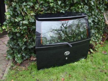 Achterklep met spoiler, Daihatsu Cuore zwart. beschikbaar voor biedingen