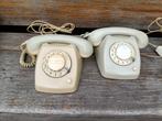 2 oude vintage telefoons met draaischijf. Ericsson.PTT T-65, Ophalen