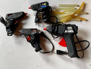 4 "Glue Guns" lijmpistolen. beschikbaar voor biedingen