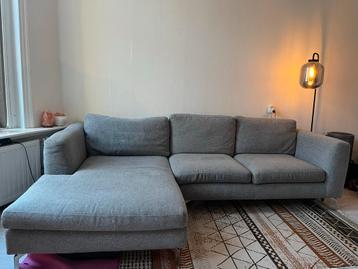Grijze hoekbank met chaise longue