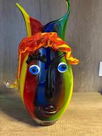 Gekleurde Vaas, Ophalen