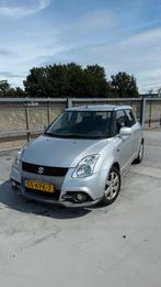 Suzuki Swift 1.3 5D 2010 Grijs, Auto's, Suzuki, Voorwielaandrijving, Stof, Zwart, 400 kg