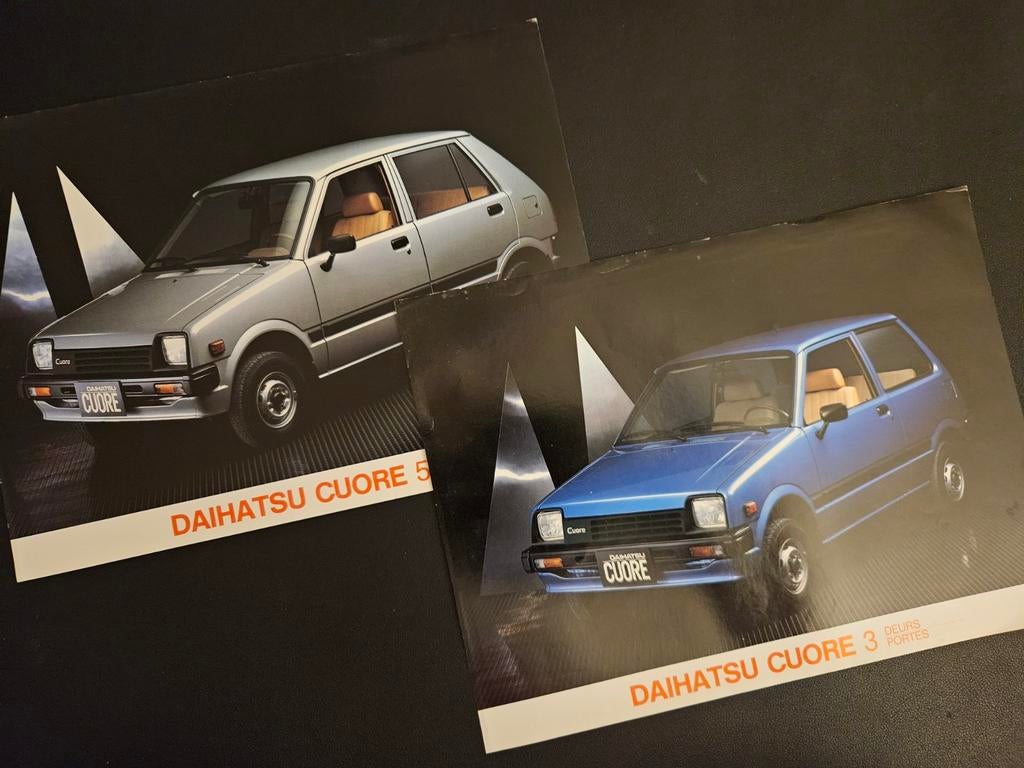 2 Leaflets Daihatsu Cuore, Ophalen of Verzenden, Gelezen
