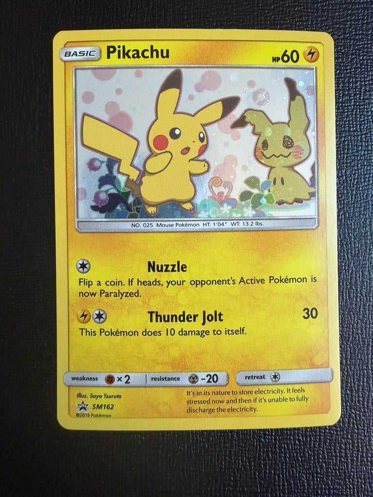 Pokemon Pikachu SM162 Black Star Promo, Ophalen of Verzenden, Zo goed als nieuw