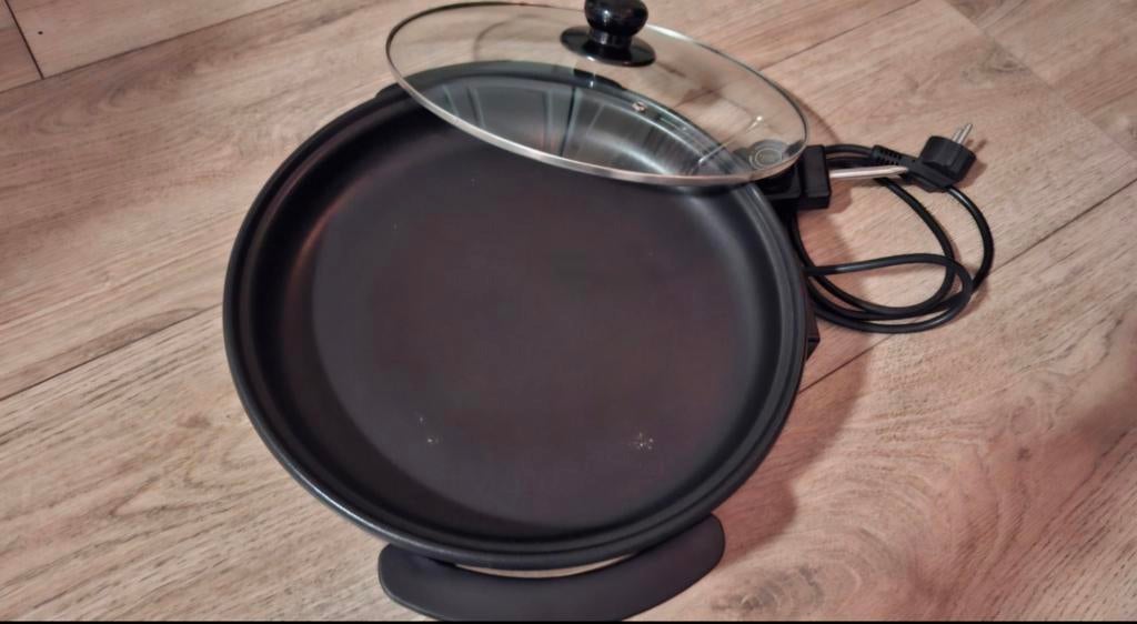 Elektrische pizzapan, Ophalen