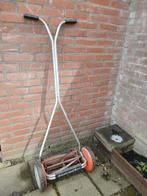 Grasmaaier werkend, Ophalen, Gebruikt