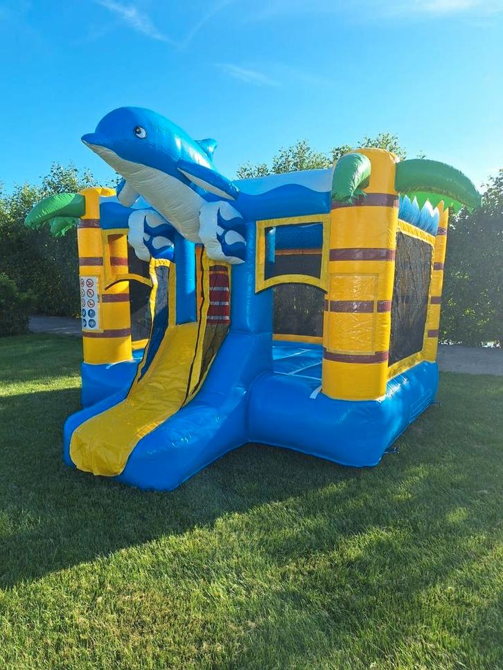 Springkussen met glijbaan "Dolfijn" te huur!, Kinderen en Baby's, Speelgoed | Buiten | Springkussens, Nieuw, Ophalen