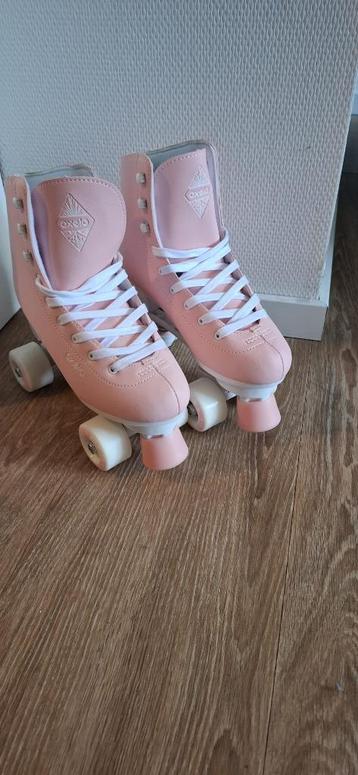 Oxelo rolschaatsen (lichtroze, klassieke quads) beschikbaar voor biedingen