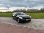 BMW 1 Serie 118i 136pk trekhaak Aut 2016, Auto's, Bruin, Leder en Stof, Particulier, Geïmporteerd