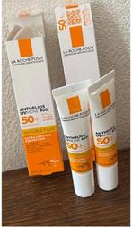 La Roche-Posay Anthelios UVMune 400 spf 50 ( 2 st *15 ml ), Sieraden, Tassen en Uiterlijk, Uiterlijk | Gezichtsverzorging, Ophalen of Verzenden
